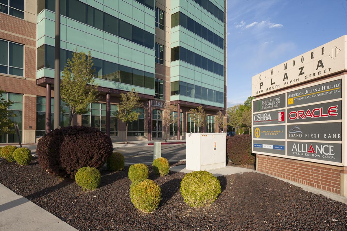 CW Moore Plaza monument signage of tenants in building